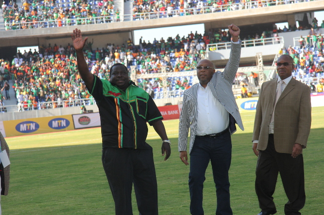 Kambwili waving to the fans at the stadium before kick off