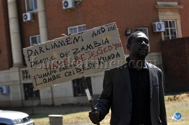 FILE: UPND deputy secretary general Kuchunga Simusamba protesting against the Chief Justice Lombe Chibesakunda outside the Supreme Court