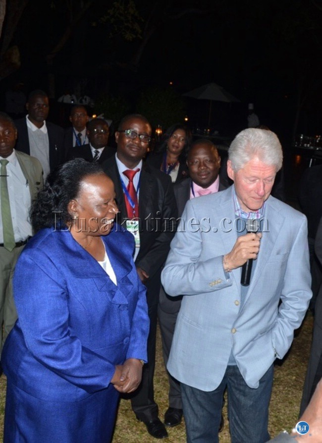 ormer US President Bill Clinton (right) and Zambia’s acting Chief Justice Lombe Chibesakunda (left) at Royal Livingstone Hotel on Thursday night during the official opening of the 2013 Southern African Chief Justices Forum and Conference and Annual General Conference.