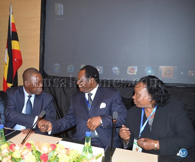 Justice Minister Wynter Kabimba (left), Southern African Chief Justices Forum chairperson Benjamin Odoki (middle) and acting Chief Justice Lombe Chibesakunda (right) during the just ended 2013 Southern African Chief Justices Forum and Conference and Annual General Conference at Zambezi Sun Hotel in Livingstone