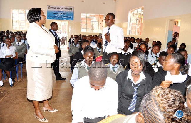 A pupil asks Dr.Kaseba a question during her lecture at David Kaunda Technical High School in Lusaka