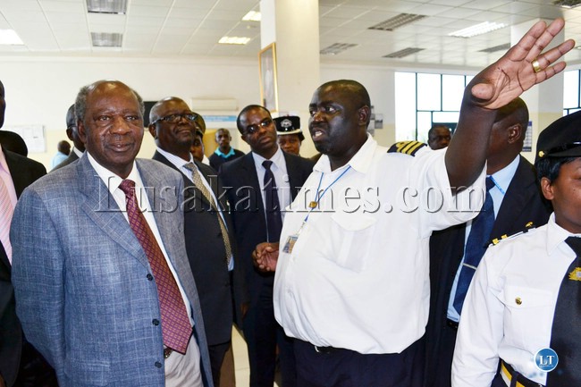 Finance Minister Alexander Chikwanda listens to Zambia Revenue Authority Collector - Customs Services - Levy Simatimbe during his visit to Kasumbalesa border post recently