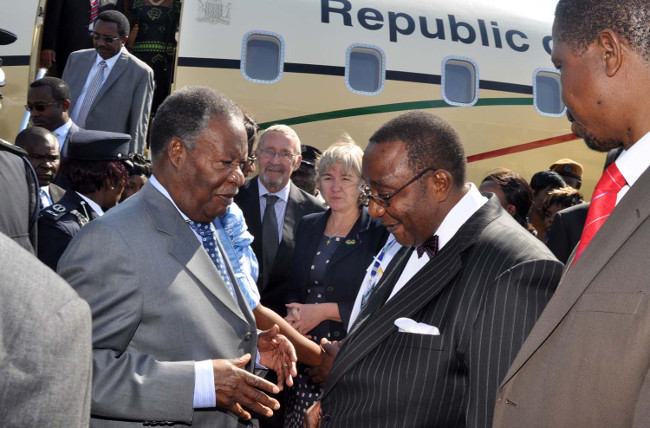 President Michael Sata with Defence minister minister Geoffrey Mwamba on Arrival at Harry Mwaanga Nkumbula International Airport for the opening of the UNWTO 20th General Assembly in Livingstone. Looking on are Vice-President's Spouse and Southern Province minister Daniel Mukombwe -Picture by THOMAS NSAMA