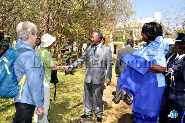 President Michael Sata Sata interacts with tourists on arrival at Royal Zambezi Hotel for the opening of the UNWTO 20th General Assembly -Picture by THOMAS NSAMA