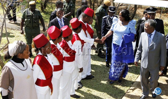 President Michael Sata and First Lady Dr Christine Kaseba greets Royal Zambezi Hotel workers on arrival for the opening of the UNWTO 20th General Assembly -Picture by THOMAS NSAMA