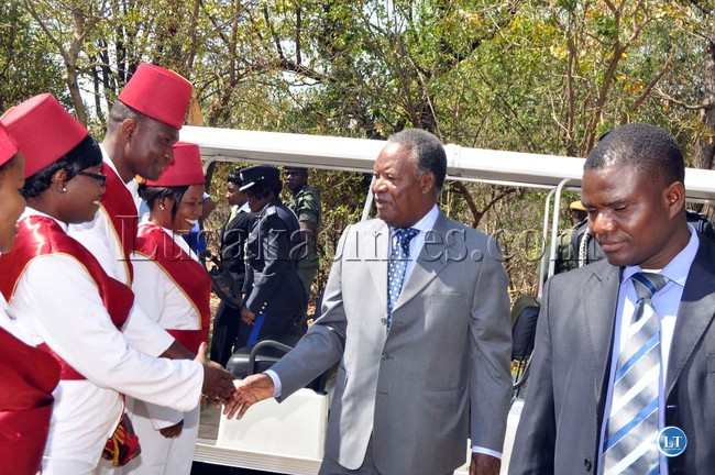 President Michael Sata greets Royal Zambezi Hotel workers on arrival for the opening of the UNWTO 20th General Assembly -Picture by THOMAS NSAMA
