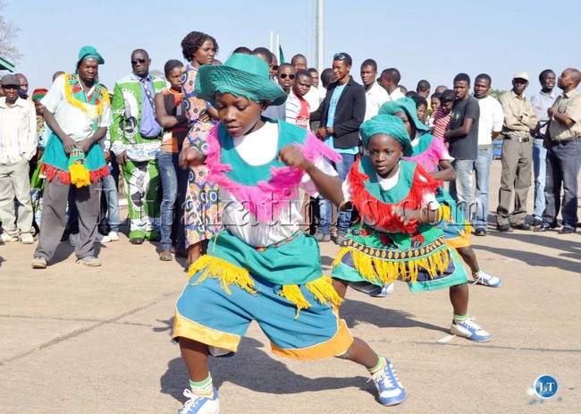 Traditional Dancers entertaining delegates shortly before President Michael Sata arrived at Harry Mwaanga Nkumbula International Airport for the opening of the UNWTO 20th General Assembly -Picture and caption by THOMAS NSAMA