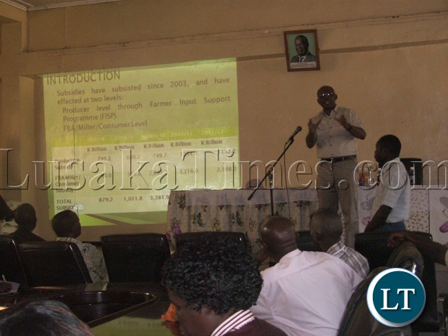 Agriculture and Livestock Minister Bob Sichinga(on stage) explains Agric statistics to Mkushi Farmers.