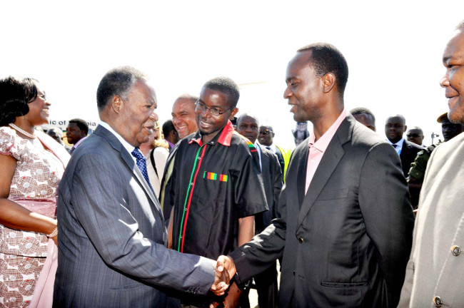 President Sata greeting Son Mulenga Sata in Livingstone recently