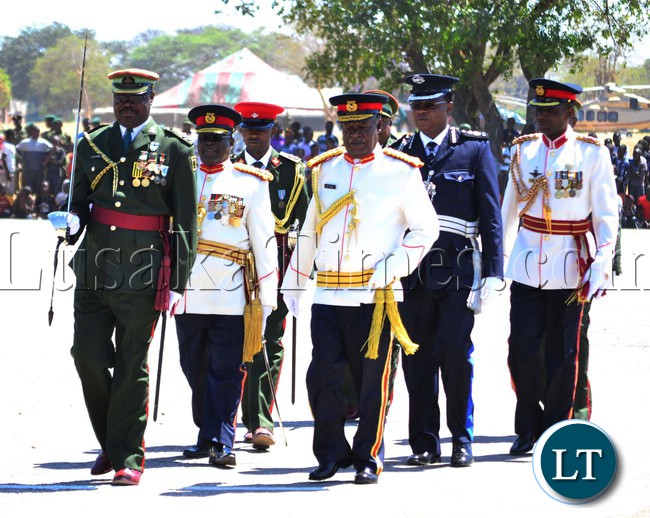 President Michael Sata inspects a guard of honour mounted by the Officer Cadets before being commissioned at Kohima barrack in Kabwe