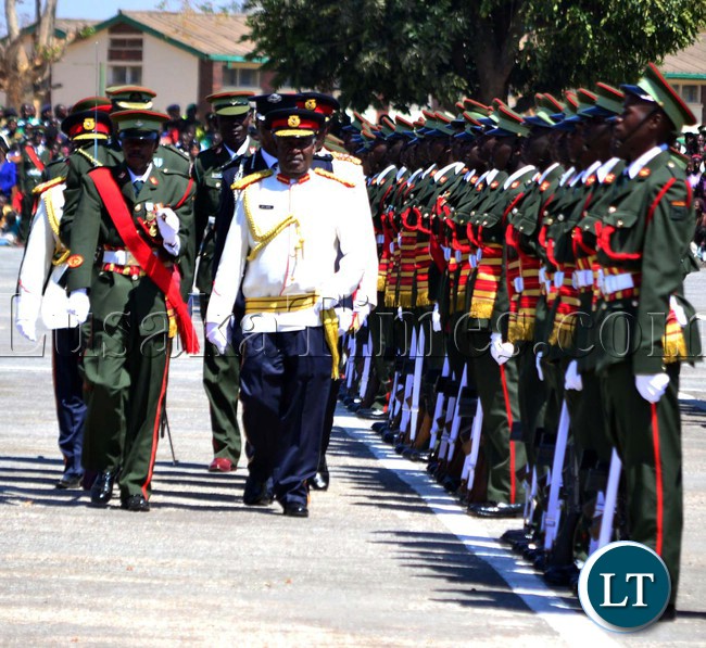 President Michael Sata inspects a guard of honour mounted by the Officer Cadets before being commissioned at Kohima barrack in Kabwe President Michael Sata inspects a guard of honour mounted by the Officer Cadets before being commissioned at Kohima barrack in Kabwe