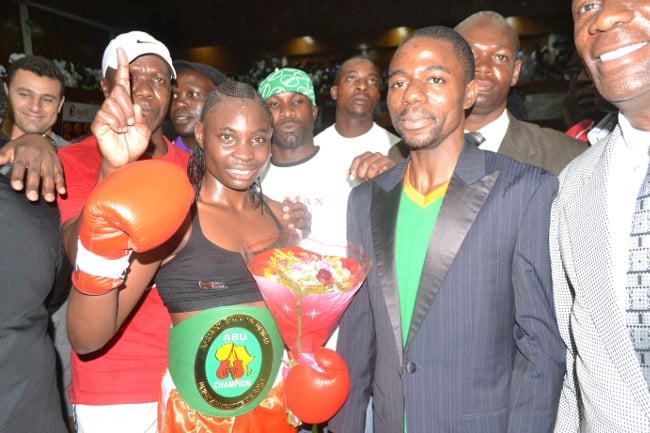 File picture:CATHERINE Phiri with Deputy Sports Minister Stephen Masumba after the fight