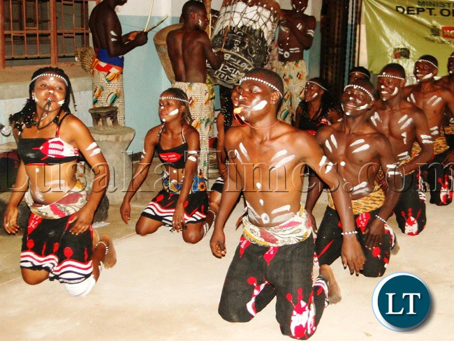 Northern Province Assistant Secretary Royld Tembo joins Kalela dance by Kasama Arts Theater at the Provincial Min-festival organized to see off exhibitors to the UNWTO in Kasama