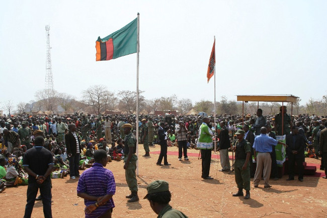 PRESIDENT Michael Sata, introduces PF Mkaika Parliament by-election candidate, David Phiri, at a rally held at Chimutende Primary School in Katete