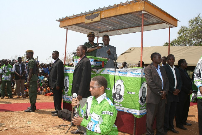PRESIDENT Michael Sata, introduces PF Mkaika Parliament by-election candidate, David Phiri, at a rally held at Chimutende Primary School in Katete
