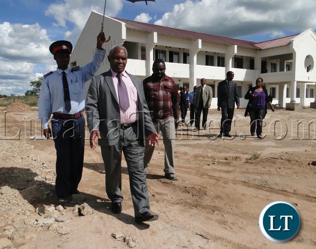 Education deputy minister Professor Neverlyn Wilombe inspecting the on-going construction works at Robert Makasa University in Chinsali Muchinga Province. Government has engaged Flame Construction Company to carry out the works which are now are 98 percent complete Education deputy minister Professor Neverlyn Wilombe inspecting the on-going construction works at Robert Makasa University in Chinsali Muchinga Province. Government has engaged Flame Construction Company to carry out the works which are now are 98 percent complete