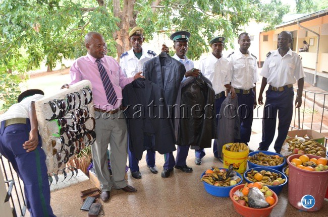 Livingstone City Council police display fruits as well as suits and other merchandise seized from vendors found selling the products illegally from the streets.