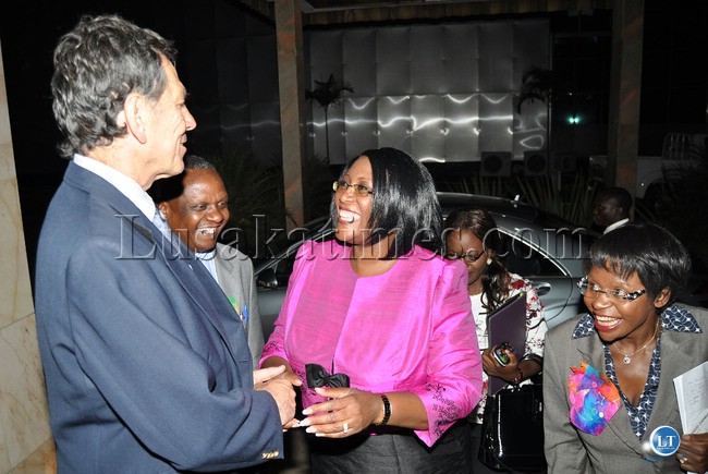 First Lady Dr Christine Kaseba being welcomed by USAID/Zambia deputy Health Team Leader Jorge Velasco on arrival at Mulungushi International Conference Centre for the Launch of the dissemination of the 8 year national family scale up plan in Lusaka