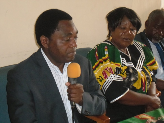 Hakainde Hichilema addressing the media