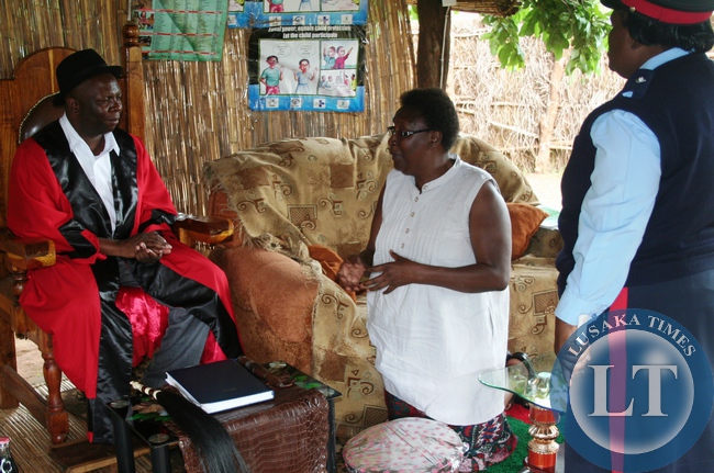 Central Province Permanent Secretary Edwidge Mutale paying homage to Chief Chamuka of the Lenje people in Chisamba District when she paid a courtesy call on the traditional leader recently.