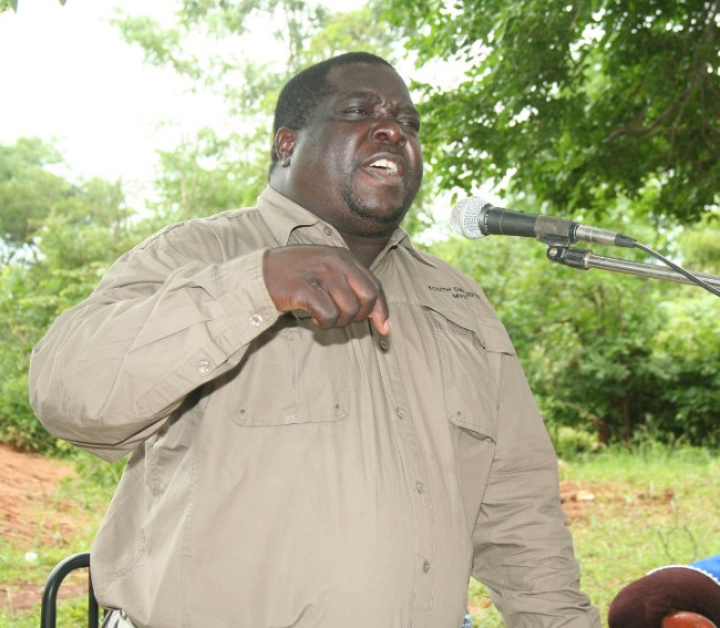 MINISTER of Youth and Sport, Chishimba Kambwili, addresses a developmental meeting at Kawawa Primary school in Kasenengwa constituency in Chipata on Wednesday