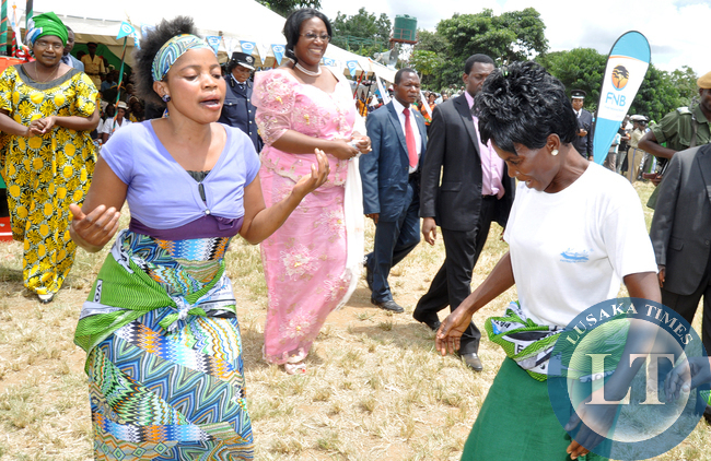 First Lady Dr Christine Kaseba being entertained by Southern Province women during the Commemoration of the International Women's Day in Mazabuka