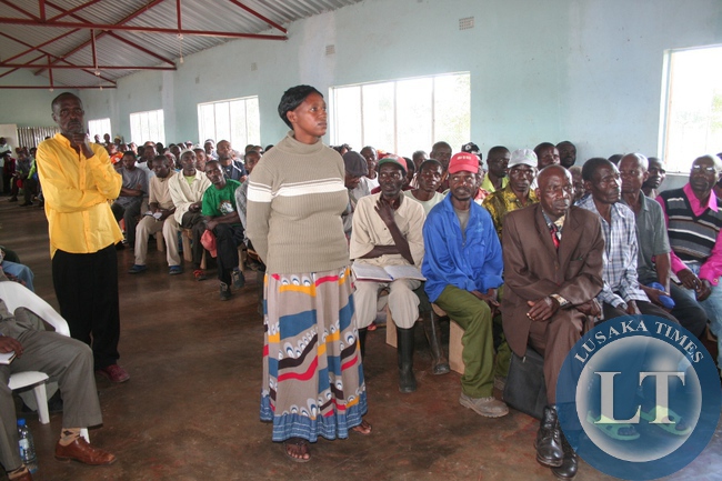 RWANDESE refugee spokesperson Caritas Mukamana asking a question to Home Affairs permanent secretary Dr Peter Mwaba ( not in picture) on the local integration process by government on the former refugee during the meeting with them at Maheba refugee camp in Solwezi