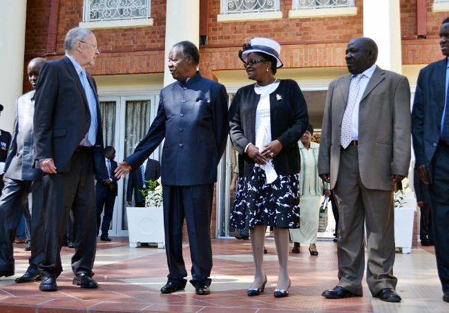 President Michael Sata receives an affidavit from newly appointed1 President Michael Sata (second from left) talks to Vice President Guy Scott (left) as newly appointed Community Development Mother and Child Deputy Minister Ingrid Mpande and Information and Broadcasting Services Permanent Secretary Bert Mushala (right) look on at State House