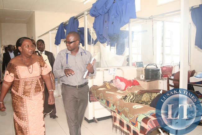 Lewanika General Hospital Acting Superintend Dr.George Soko (r) confers with Western Province Minister Josephine Limata (l) as she was going round the wards during her inspection tour at Lewanika General Hospital in Mongu District, Western Province,