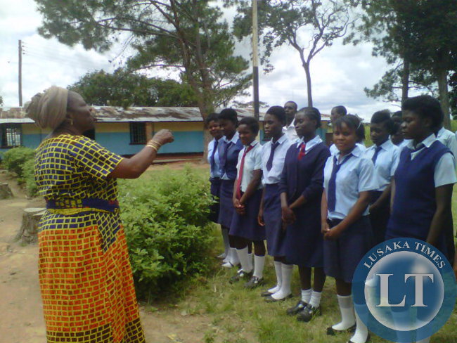 FILE: Deputy Minister in the Ministry of Chiefs and Traditional Affairs Susan Kawandami talks to pupils in Ndola