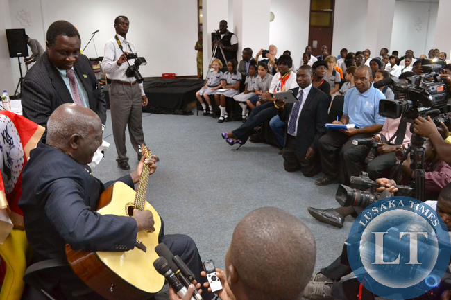 First Republican President Dr Kenneth Kaunda sings for school pupils at Mulungushi International Conference Centre in Lusaka