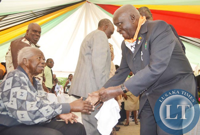 First Republican President Dr Kenneth Kaunda (right) greets fellow Freedom Fighter Peter Matoka. This was at the launch of Dr Kaunda's 90th birthday celebrations in Lusaka