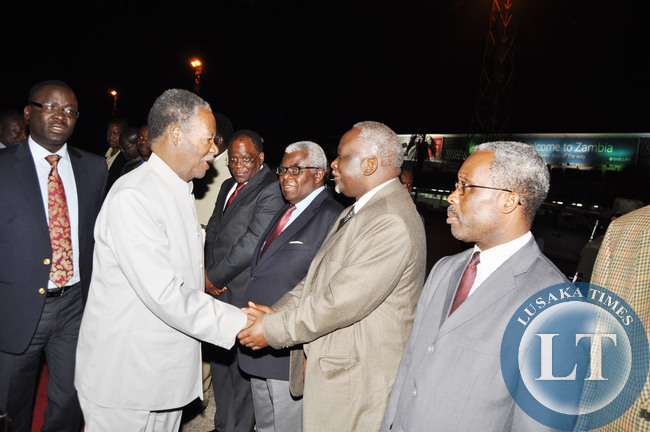 President Sata shaking hands with George Zulu