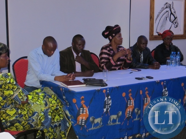 Nawakwi addressing the Press at Sherbourne Lodge in Kitwe. To her immediate right is William Wilima and to her immediate left is Caphes Musonda the two MMD defectors.