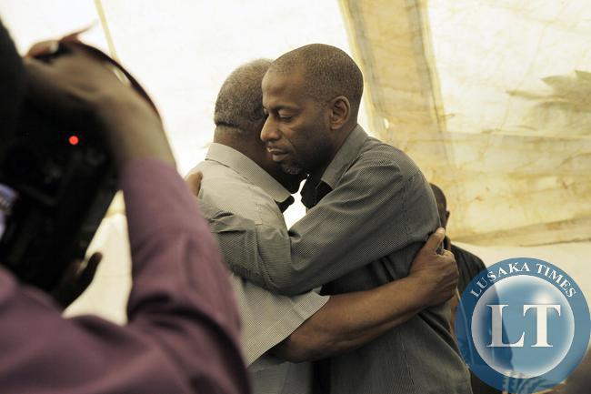President Banda hugs the Late Dennis Liwewe's son Liwewe Liwewe