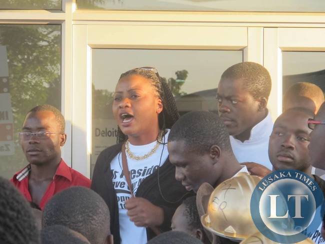 Action Aid Zambia Country Director Pamela Chisanga addressing protestors