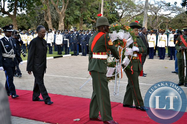 President Michael Sata goes to lay a wreath at the freedom statue in Lusaka on Sunday