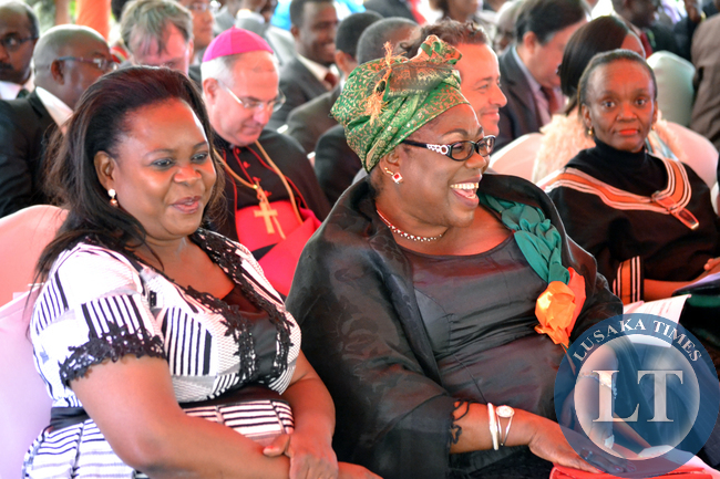 Former first ladies Dr Maureen Mwanawasa (left) and Vera Tembo share a light moment at State House