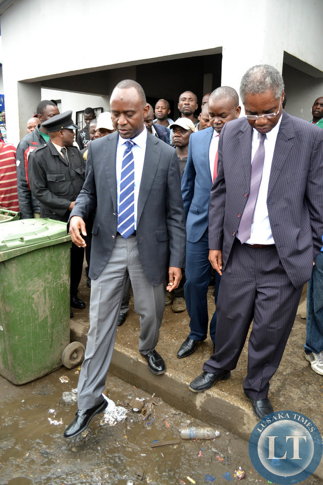Local Government Minister Emmanuel Chenda (right) and Lusaka Mayor Mulenga Sata visit Lusaka town centre market