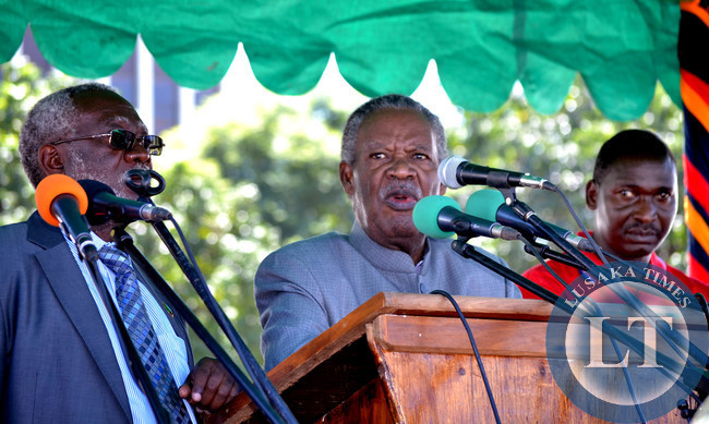 President Michael Sata is flanked by Labour Minister Fackson Shamenda (left) and Zambia Congress of Trade Unions president Leonard Hikaumba (right) at Labour Day celebrations in Lusaka