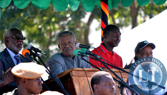 Labour Minister Fackson Shamenda (left), President Michael Sata, Zambia Congress of Trade Unions president Leonard Hikaumba and Federation of Free Trade Unions president Joyce Simukoko (right) watch the Labour Day march past in Lusaka Labour Minister Fackson Shamenda (left), President Michael Sata, Zambia Congress of Trade Unions president Leonard Hikaumba and Federation of Free Trade Unions president Joyce Simukoko (right) watch the Labour Day march past in Lusaka