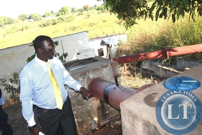 GOVERNMENT says it will revamp operations once it takes over the Mununshi Banana scheme in Mwense District. Currently, most equipment at the Banana plantation is broken down. In the picture, Luapula Province Permanent Secretary Chanda Kasolo inspects one of the broken pumps recently