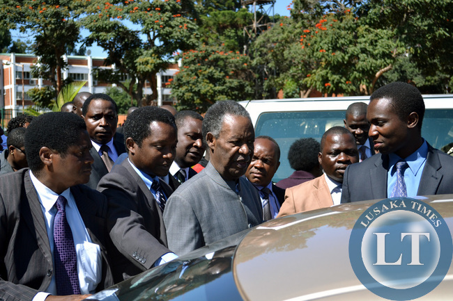 President Michael Sata leaves the Lusaka High after attending a court case