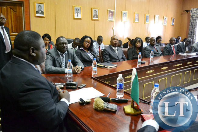 Transport, Works, Supply and Communications Minister Yamfwa Mukanga addresses new Zambia Railways board members at his office in Lusaka