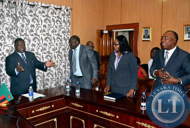 Transport, Works, Supply and Communications Minister Yamfwa Mukanga welcomes new Zambia Railways board members to his office in Lusaka