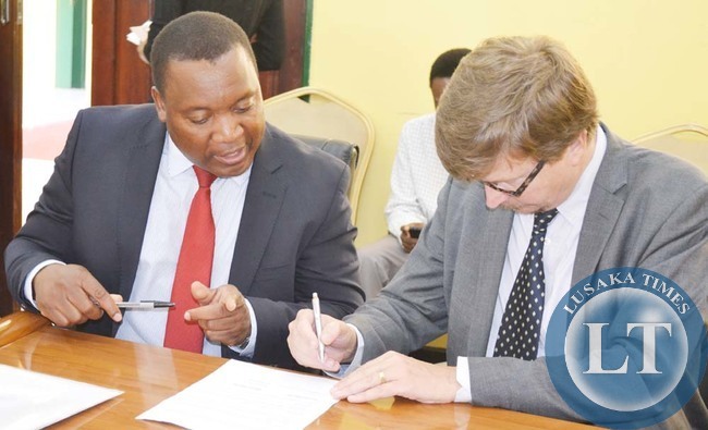 ZAMBIA National Farmers Union (ZNFU) executive director Ndambo Ndambo (left) and Finnish Ambassador to Zambia Pertti Anttinen during the signing ceremony of a Four million Euros bilateral agreement to finance the Core Support Programme (CSP) in Lusaka ZAMBIA National Farmers Union (ZNFU) executive director Ndambo Ndambo (left) and Finnish Ambassador to Zambia Pertti Anttinen during the signing ceremony of a Four million Euros bilateral agreement to finance the Core Support Programme (CSP) in Lusaka