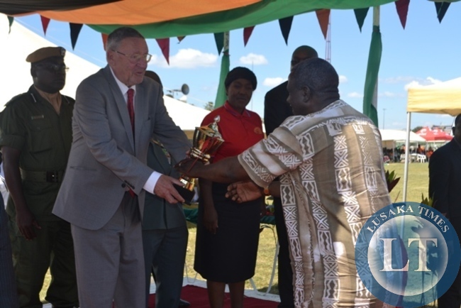 VICE-PRESIDENT Guy Scott presents the Best Disciplined Company award to Mopani Copper Mines representative during the Labour Day celebrations at Diggers Rugby Club in Kitwe