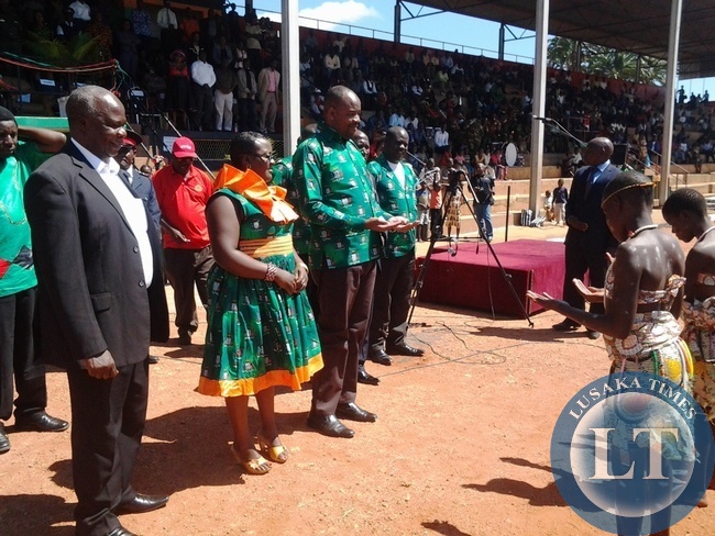 L-R:Eastern Province Patriotic Front Chairperson Lameck Mangani and Eastern Province Minister Malozo Sichone being entertained by the Smiling Kids during the labour day celebrations in Chipata