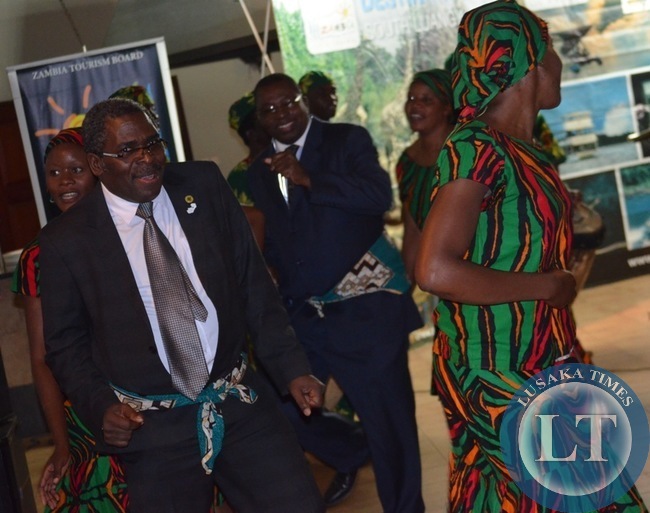 Tourism and Arts Permanent Secretary Stephen Mwansa (left) dances with Zambia National Dance troupe Livingstone based artists and other delegates during a cocktail hosted for RETOSA delegates in Livingstone at Chrismar Hotel on Wednesday night Tourism and Arts Permanent Secretary Stephen Mwansa (left) dances with Zambia National Dance troupe Livingstone based artists and other delegates during a cocktail hosted for RETOSA delegates in Livingstone at Chrismar Hotel on Wednesday night