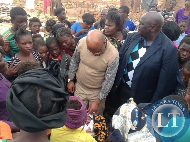 Dr Mumba listens to the cries of the stranded villageres_1
